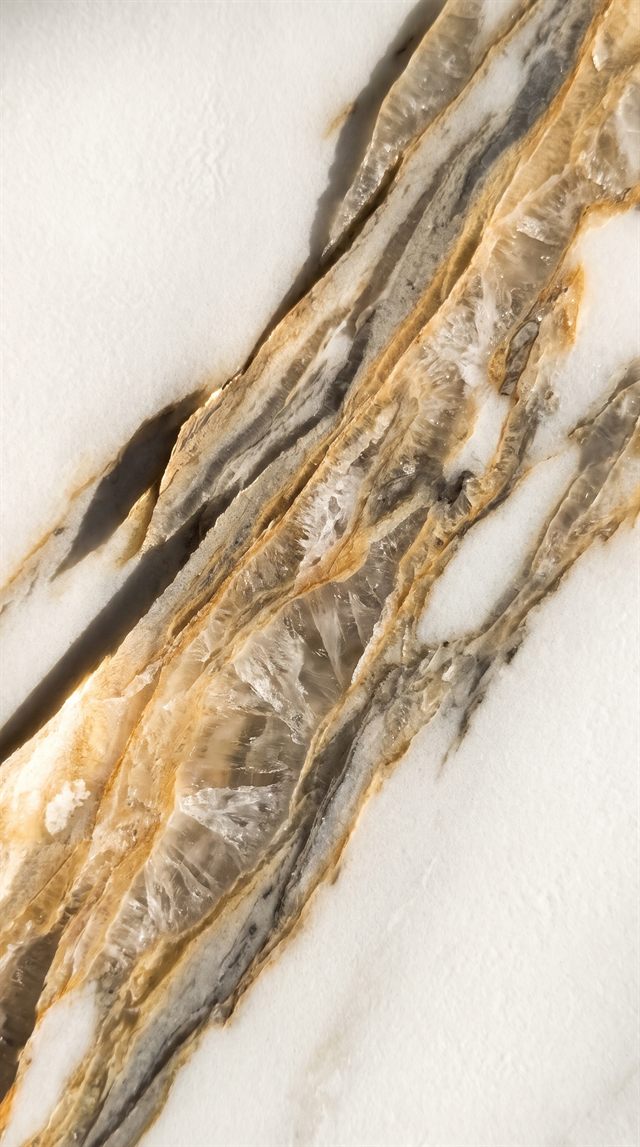 Carrara Gold — makro-nærbillede af åre-struktur og materialedybde